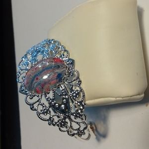 Antique style silver cuff bracelet w/one of a kind center w/blue,pink,red,white